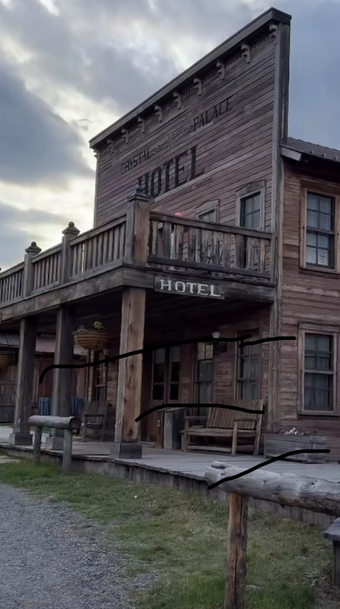 Historic western-style lodge building on the First Services Group Montana ranch property